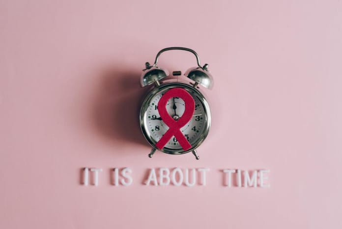 Alarm clock with HIV ribbon
