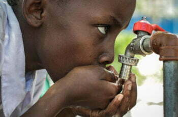 Boy accessing clean drinking water