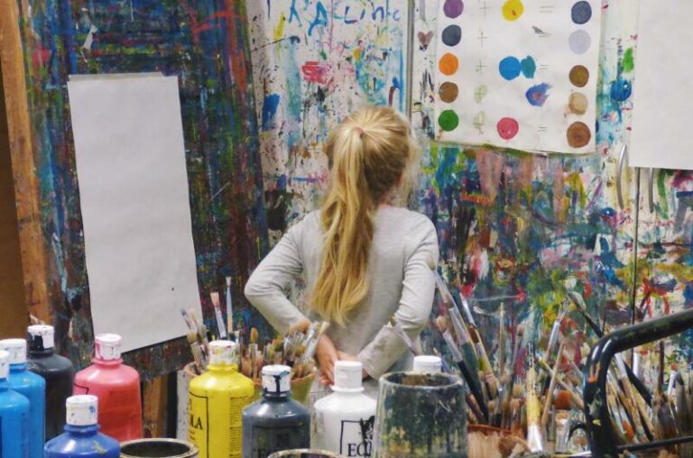 Girl looking at art