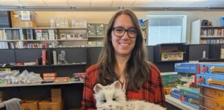 Meet the amazing robot cats you can check out from this library Librarian holds robot cat